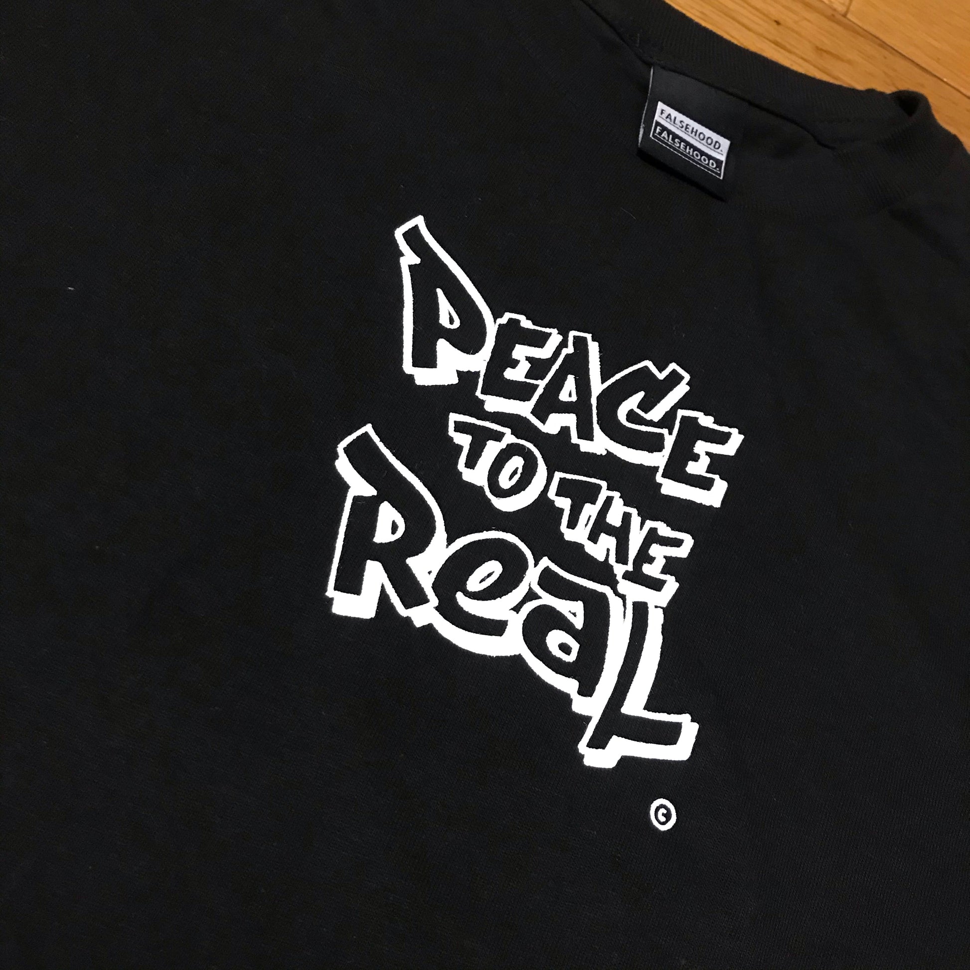 PEACE TO THE REAL. © Tee - FALSEHOOD.