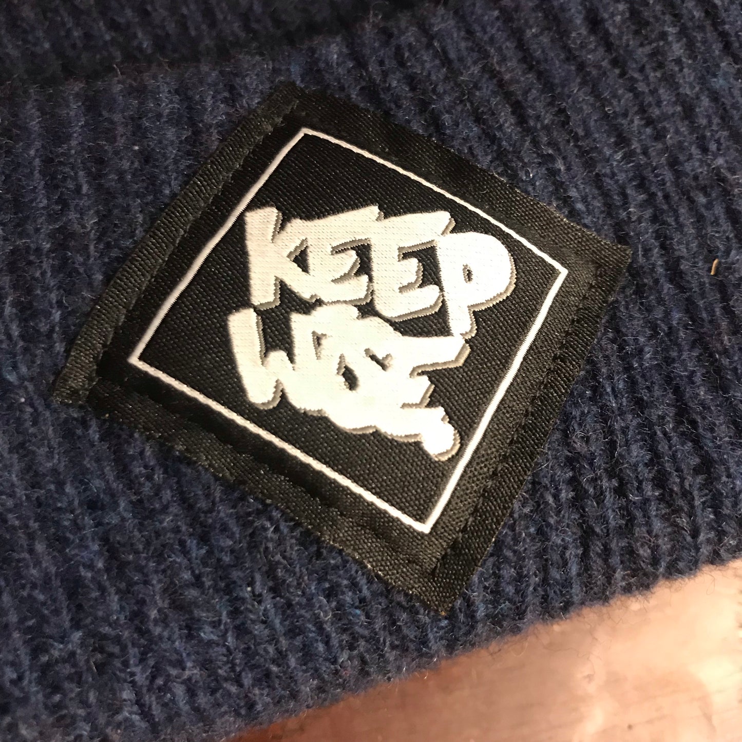 KEEP WISE. Merino Wool Beanie - FALSEHOOD.