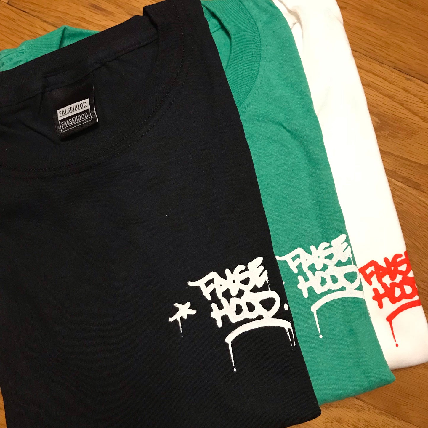 The TAG. Tee - FALSEHOOD.