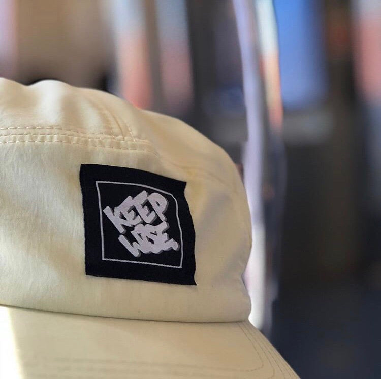 KEEP WISE. Camper Cap - FALSEHOOD.