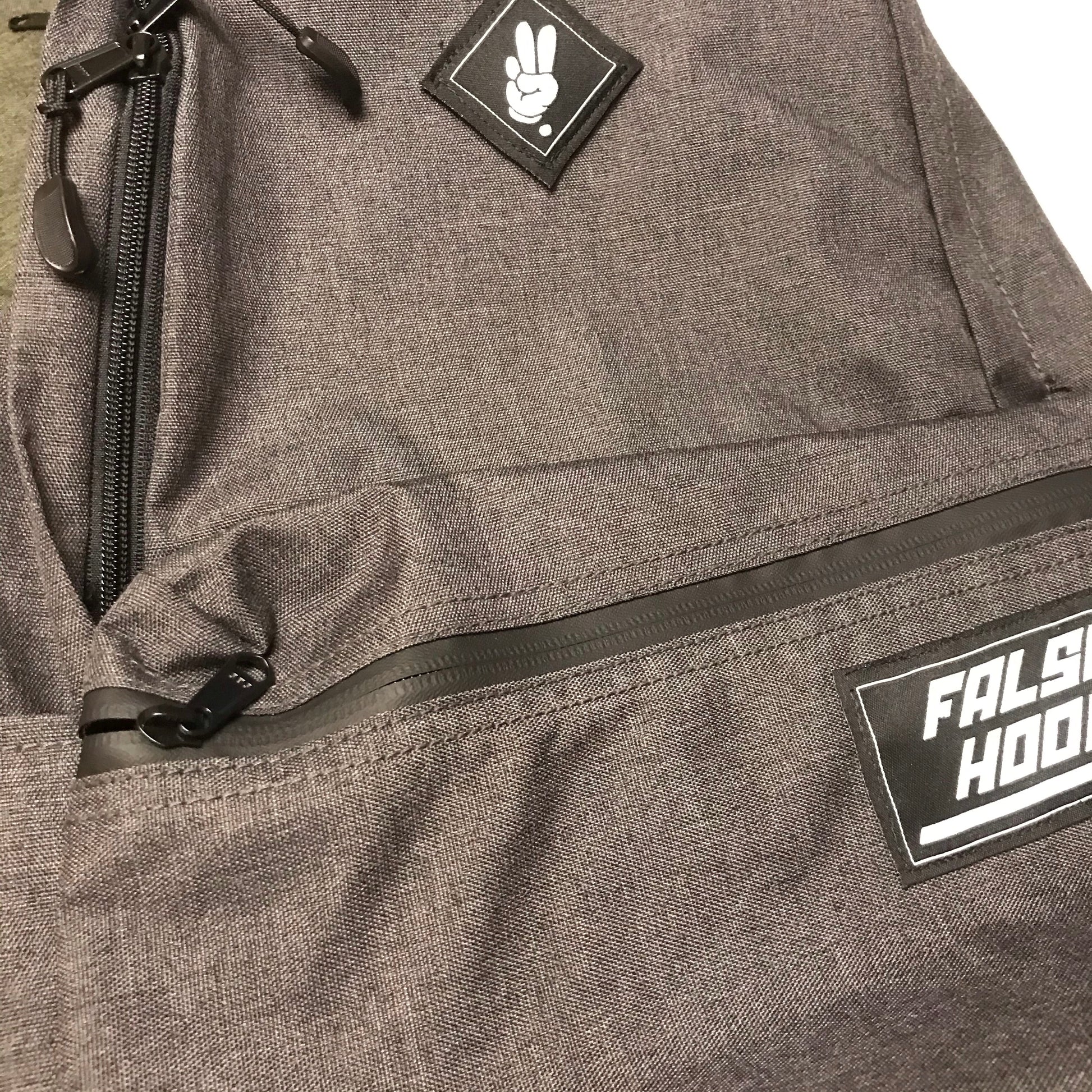 FINGERS TOGETHER. Backpack - FALSEHOOD.