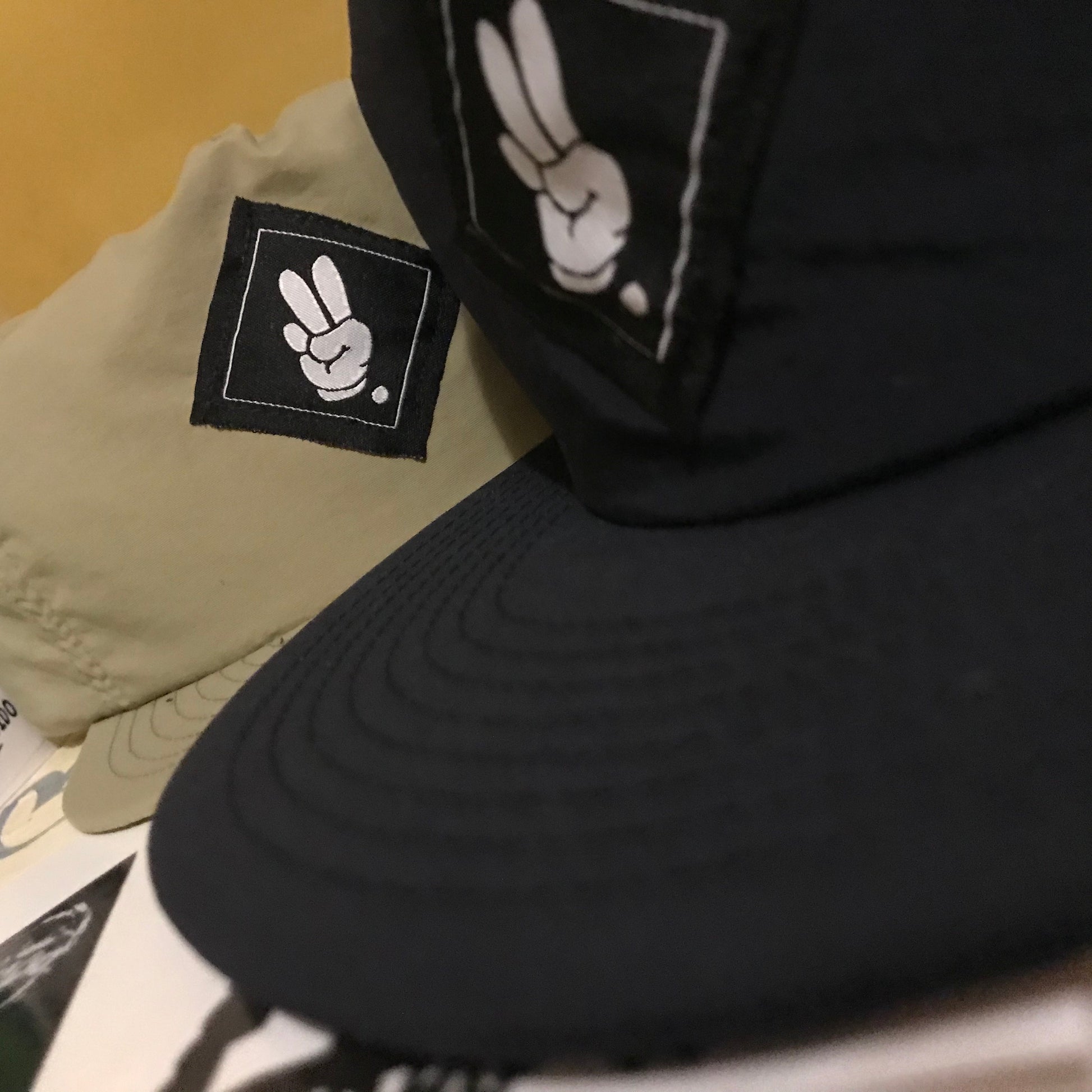 FINGERS TOGETHER. Snapback Cap - FALSEHOOD.