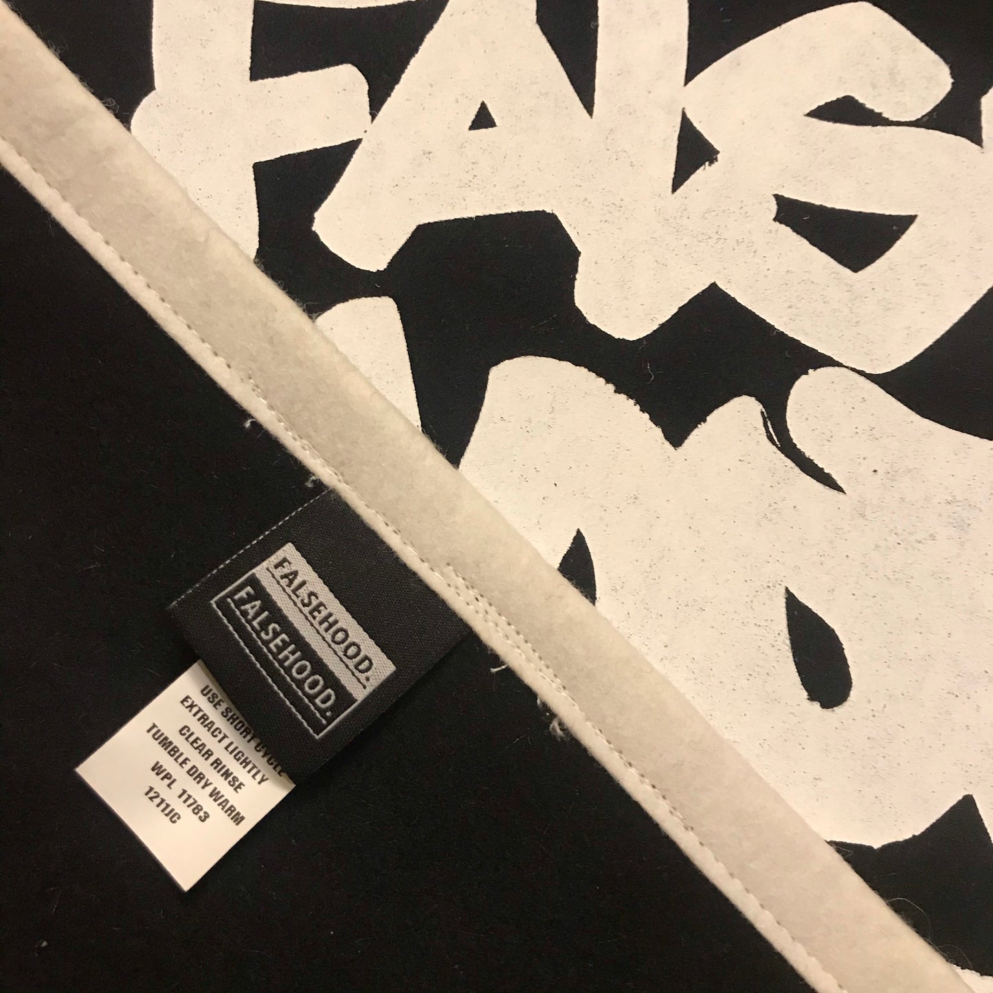 The Big TAG. Banner - FALSEHOOD.