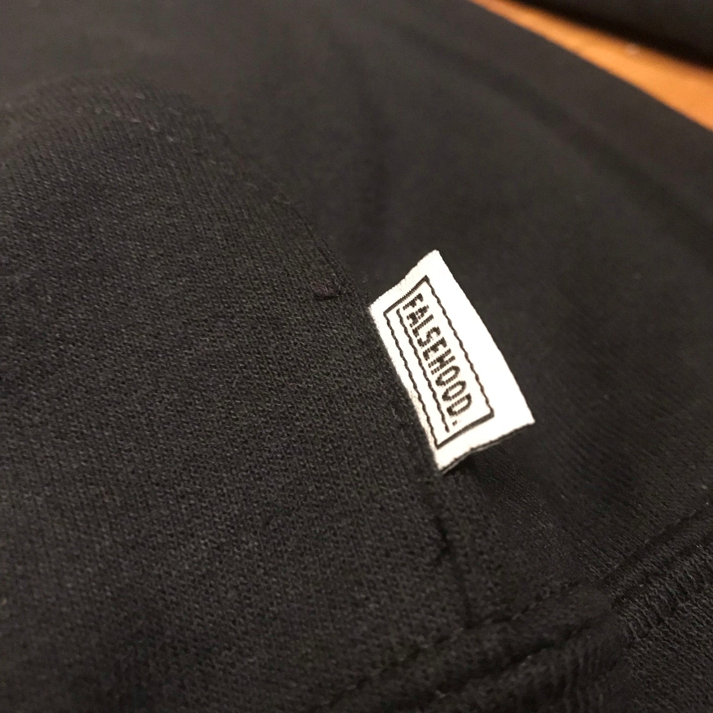 The Big TAG. Hoody - FALSEHOOD.