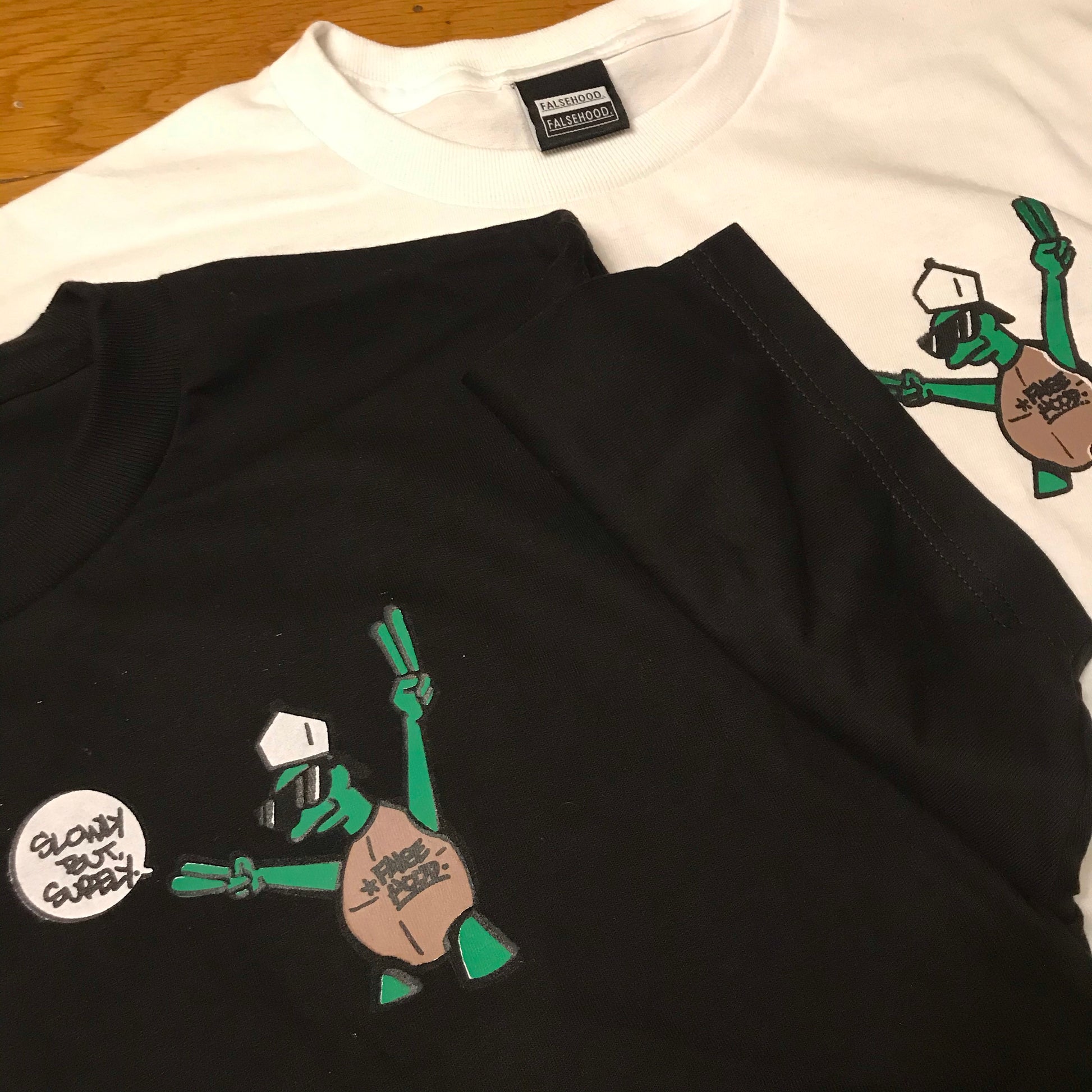 LEO The Turtle. Tee - FALSEHOOD.