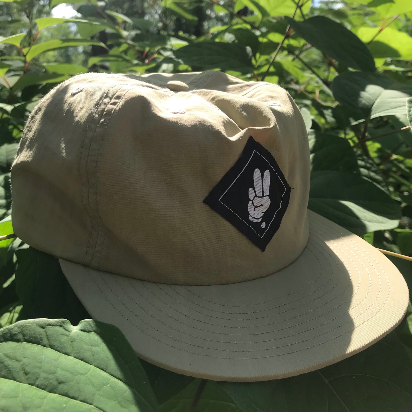 FINGERS TOGETHER. Snapback Cap - FALSEHOOD.