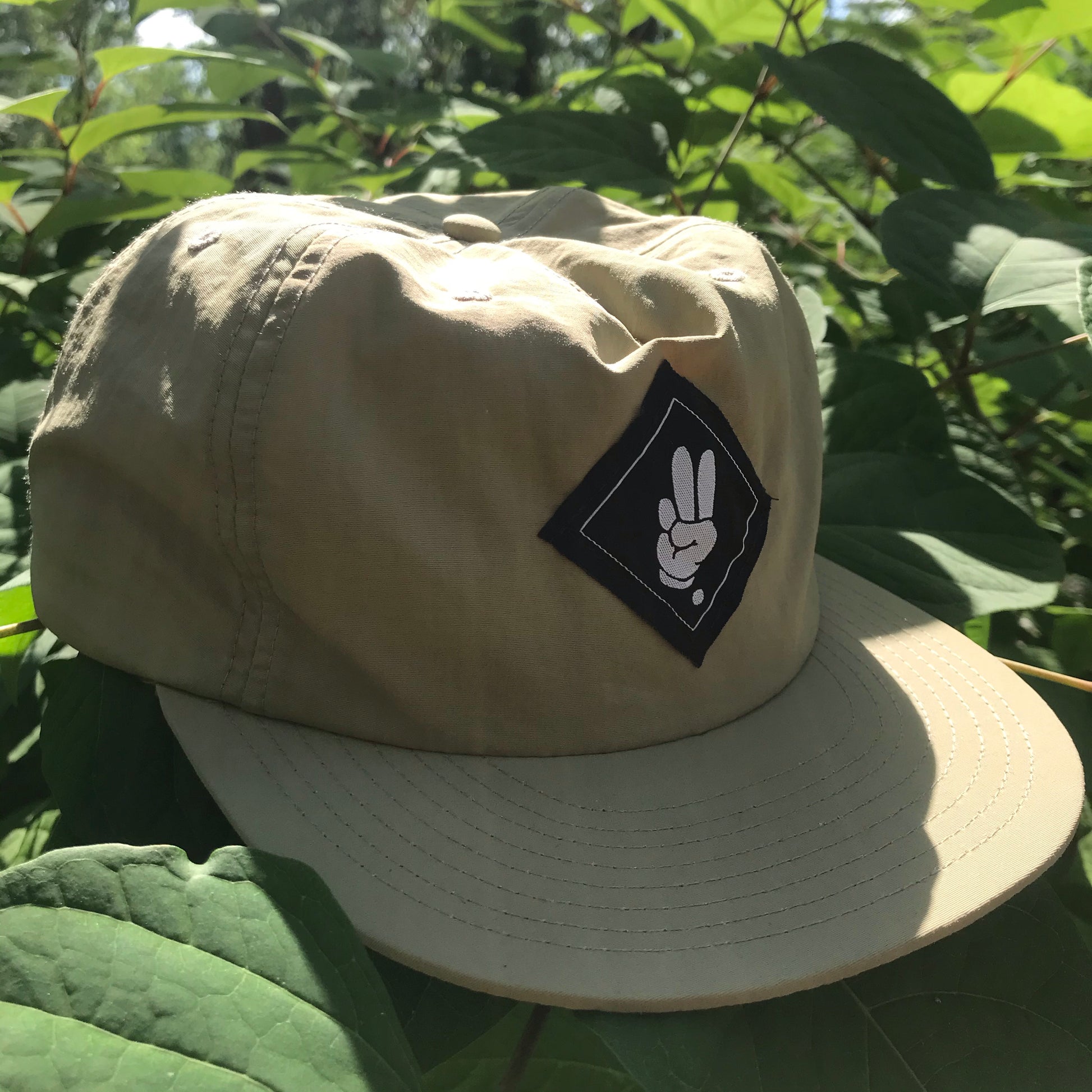 FINGERS TOGETHER. Snapback Cap - FALSEHOOD.