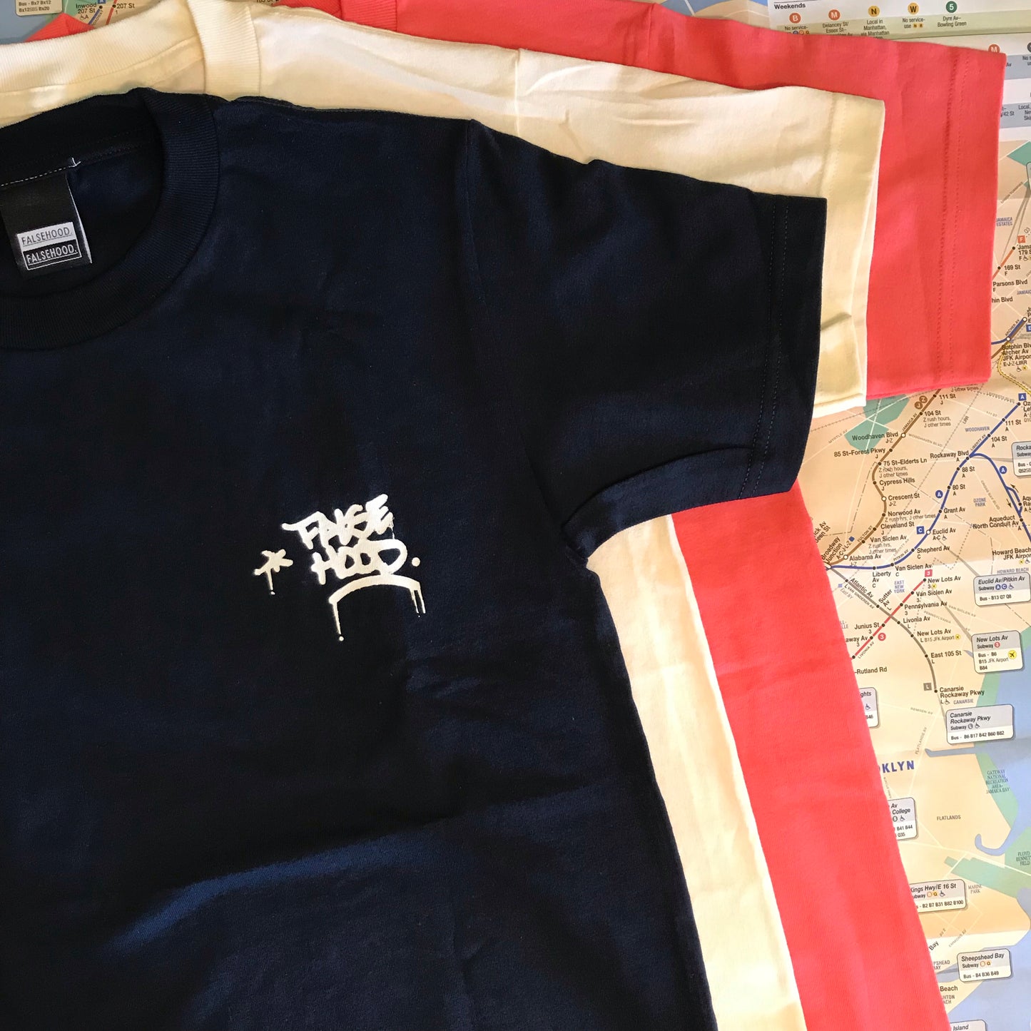 The TAG. Tee - FALSEHOOD.