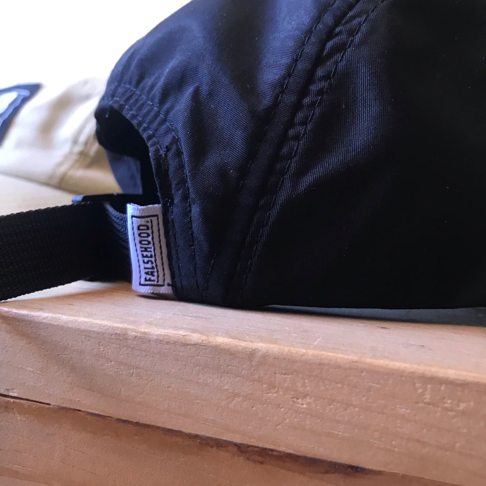 KEEP WISE. Camper Cap - FALSEHOOD.