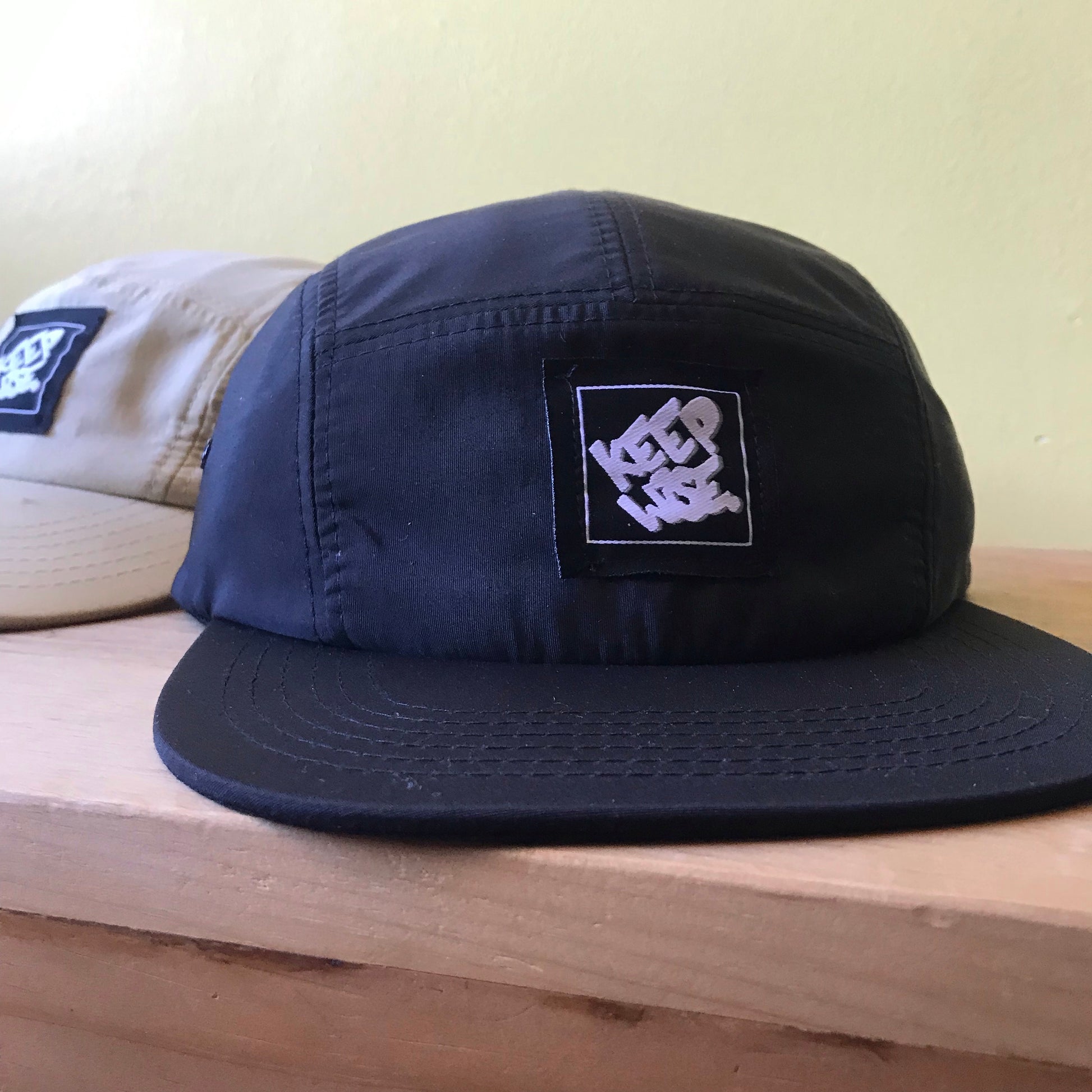 KEEP WISE. Camper Cap - FALSEHOOD.