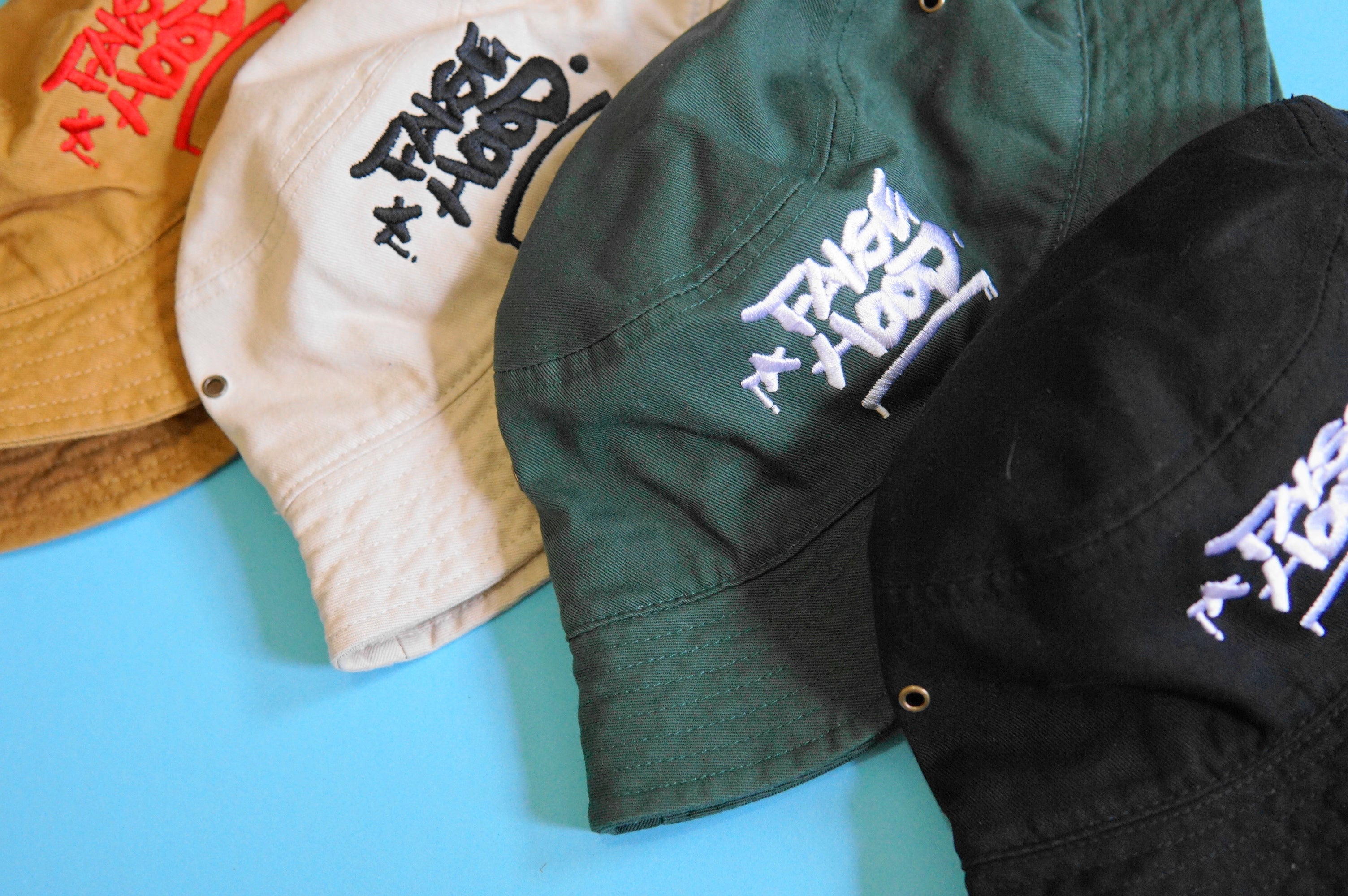 The Big TAG. Bucket Hat - FALSEHOOD.