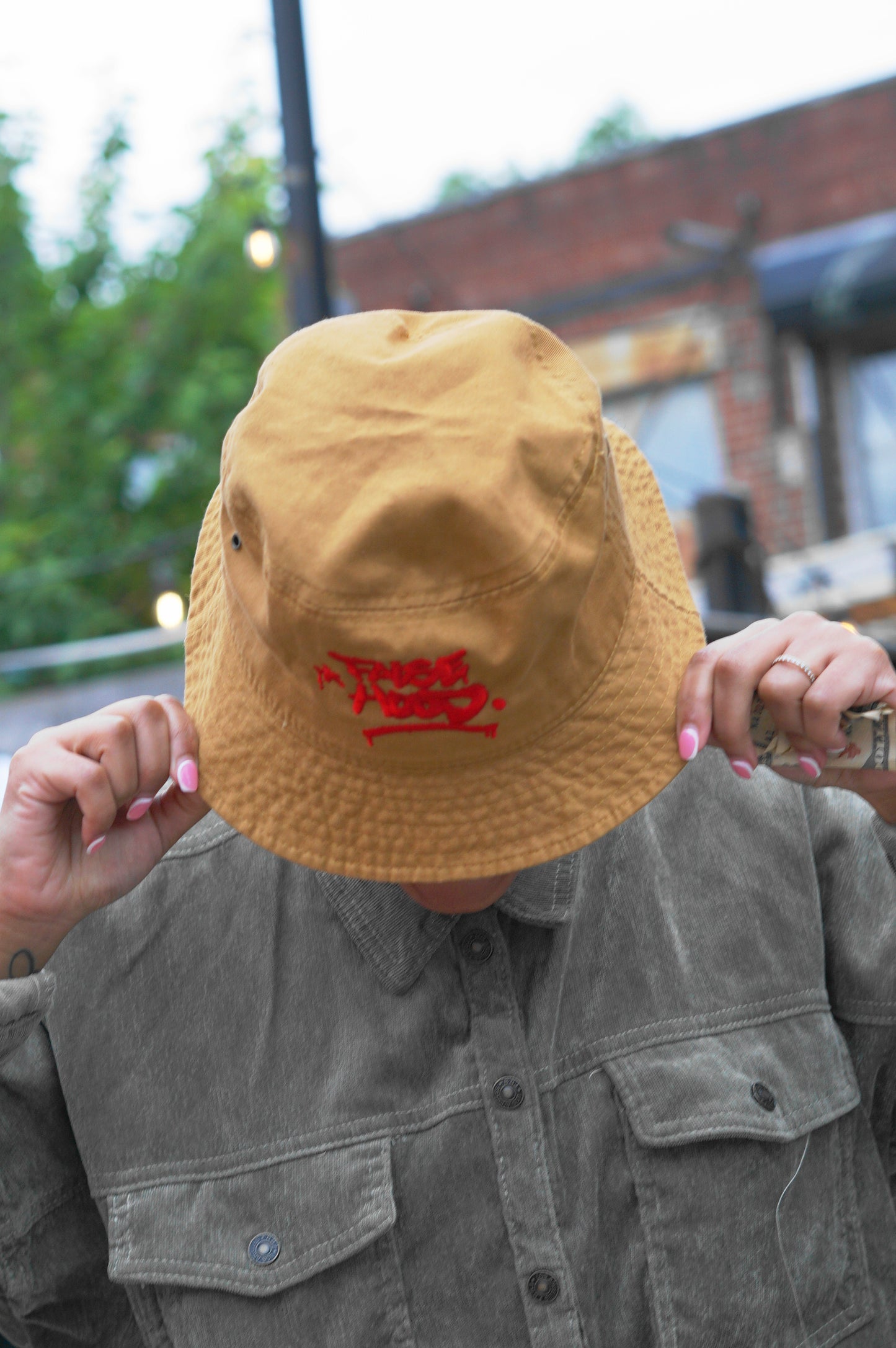 The Big TAG. Bucket Hat - FALSEHOOD.