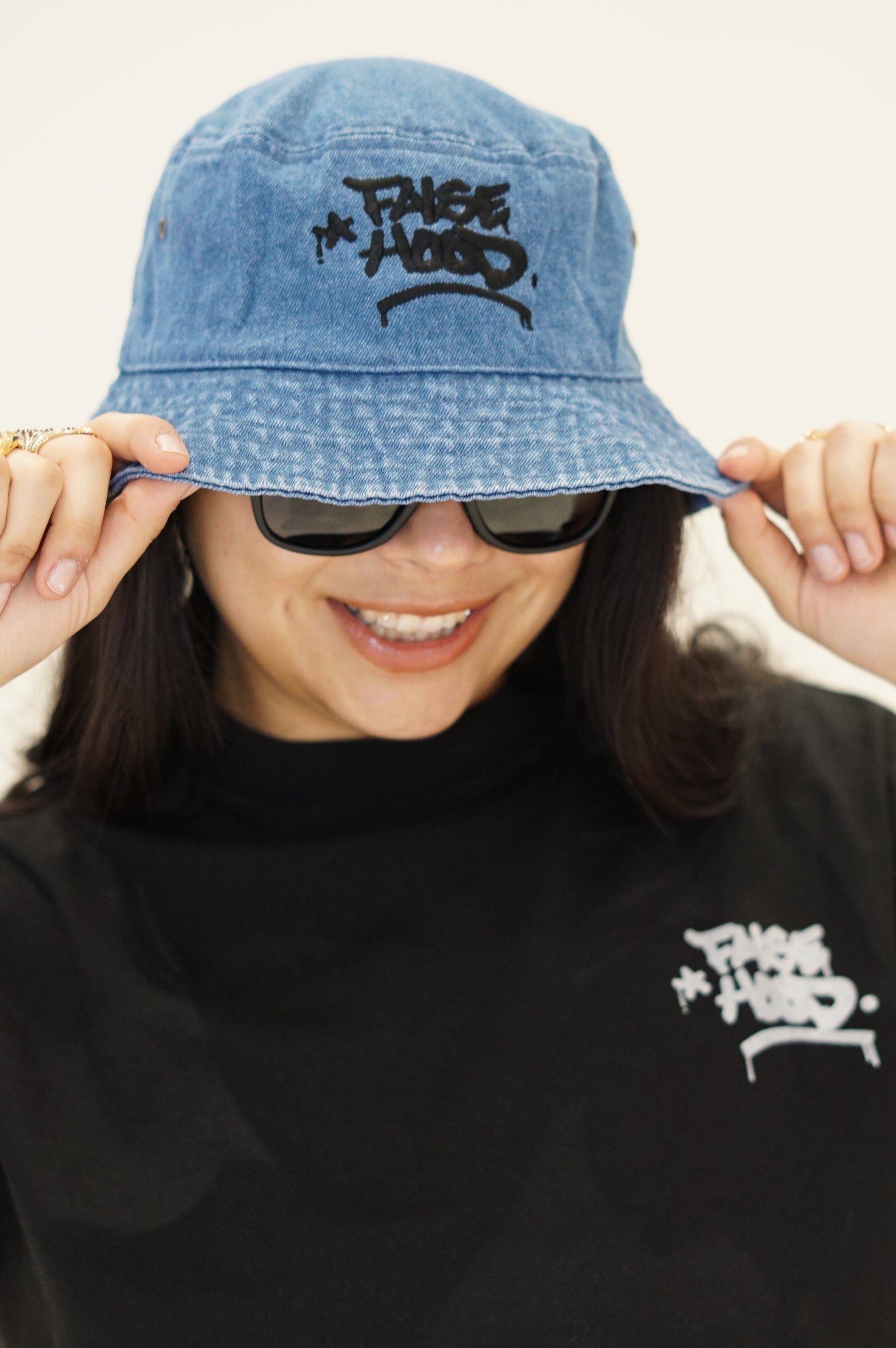 The Big TAG. Denim Bucket Hat - FALSEHOOD.