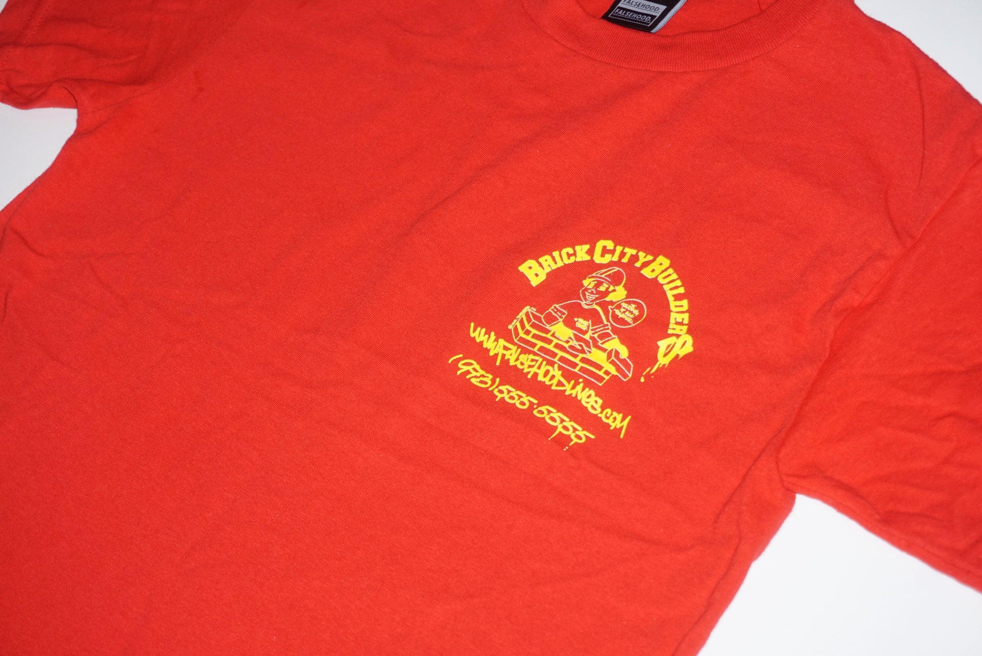 BRICK CITY BUILDERS Tee - FALSEHOOD.