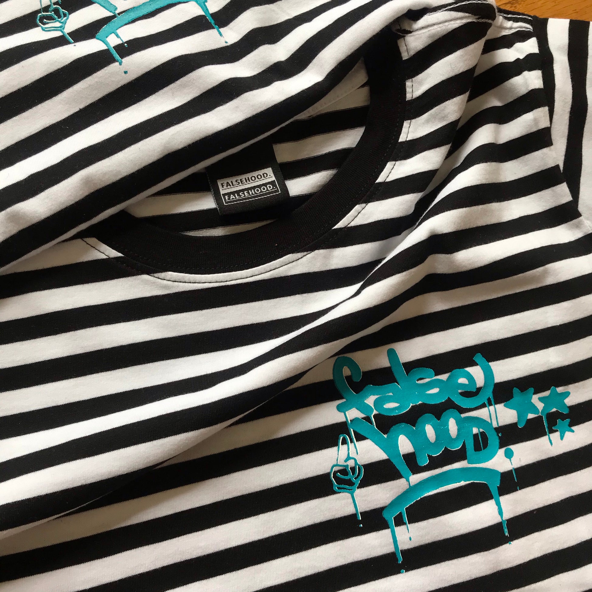 WMNS - New TAG. Stripe Tee - FALSEHOOD.